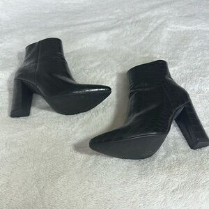 Black snakeskin bootie heel